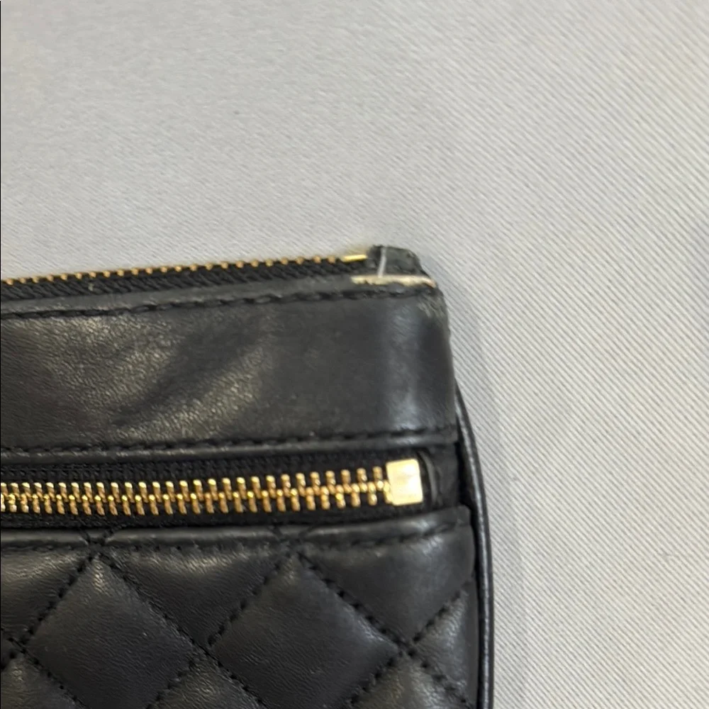 Michael Kors Black and Gold Quilted Leather Clutch